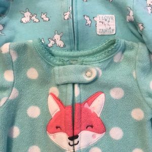 One fleece. one cotton. Play Newborn Jammies!